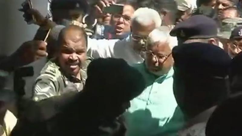 RJD Chief Lalu Yadav has gone to court straight from a hospital where he was admitted after he fell ill inside prison. (Photo: ANI)