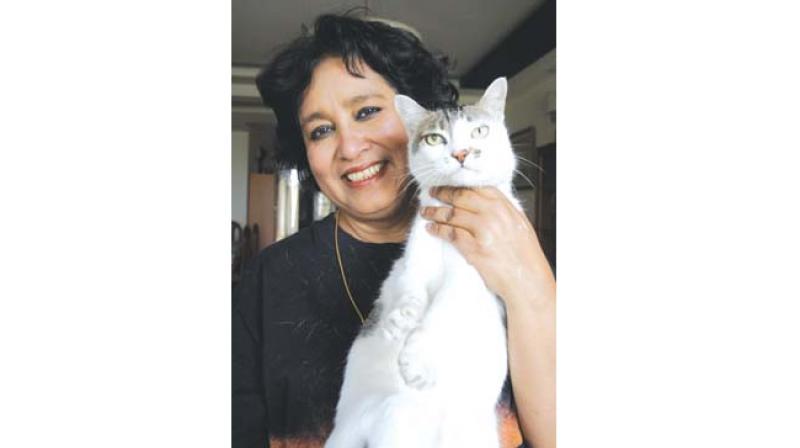 Taslima Nasrin with her cat Minu at her New Delhi home (Photo: Sondeep Shankar)