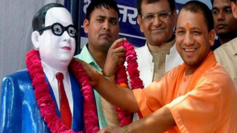 The Yogi Adityanath government has decided to introduce Ramji as the middle name of the Father of the Constitution BR Ambedkar in all official correspondence and records. (Photo: PTI)