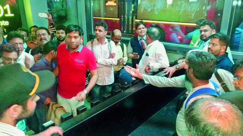 Fliers arguing with employees of an airline at the Hyderabad airport at 3 am on Thursday morning.  (Photo:DC)