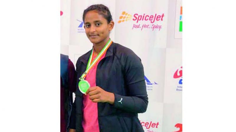 Niharika Gonella of Telangana shows off her silver medal.