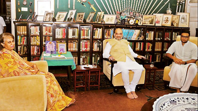 BJP president Amit Shah with Pramoda Devi Wadiyar and Yaduveer at Mysuru Palace on Friday.   (Photo:KPN)
