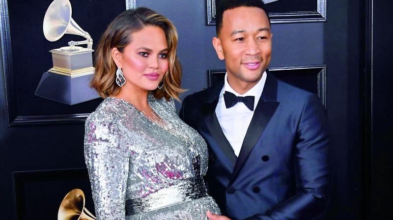 Chrissy Teigen and John lately