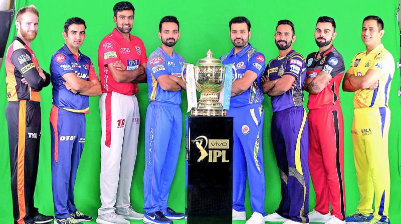 Captains of IPL teams pose with the trophy ahead of the opening match between defending champions Mumbai Indians and Chennai Super Kings in Mumbai on Friday.  (Photo:Twitter)