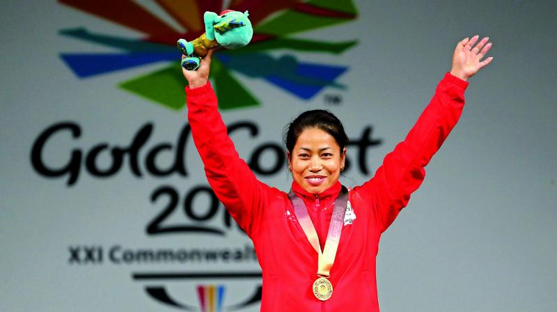 Sanjita Chanu with the gold medal in Gold Coast, Australia, on Friday.	 (Photo:AP)