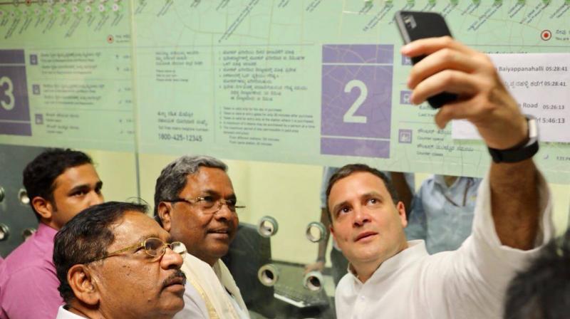 Congress president Rahul Gandhi bought the ticket at the station and took a selfie with the chief minister before boarding the jam-packed train. (Photo: Twitter/@INCIndia)