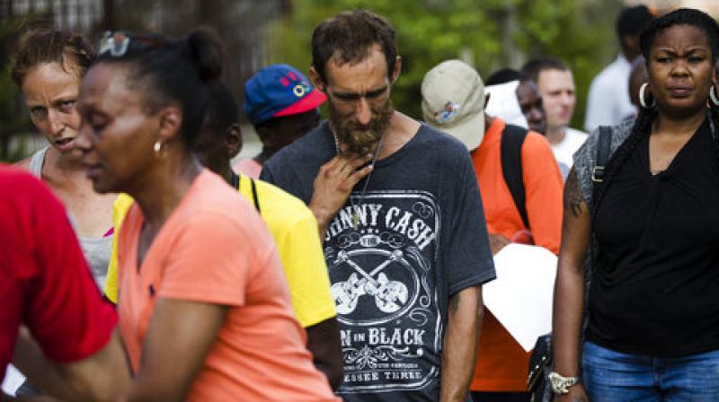 In this Monday, July 24, 2017 photo, Steven Kemp, who is addicted to heroin and is homeless, waits in line for help from a Philly Restart representative to obtain an identification card in Philadelphia, Monday, July 24, 2017. (Photo: AP)