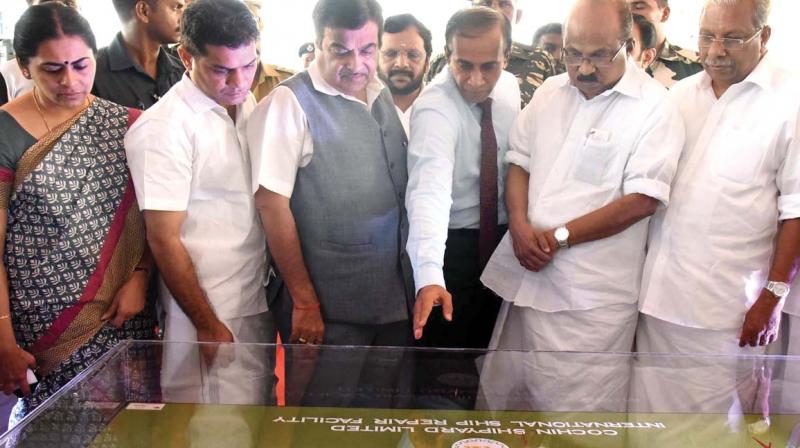 Union minister for shipping, road transport and highways Nitin Gadkari takes a look at the replica of the international ship repair facility (ISRF) to be set up by Cochin Shipyard Ltd during the ground breaking ceremony in Kochi in the presence of Mayor Soumini Jain, Hibi Eden, MLA, Cochin Shipyard chairman and MD Madhu S. Nair, Prof. K.V Thomas, MP and minister A.C. Moideen.	(Photo: SUNOJ NINAN MATHEW)