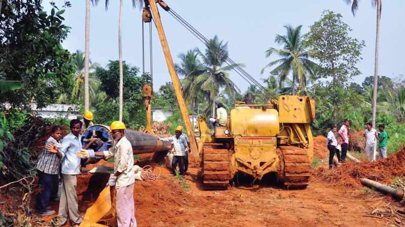 Work in full swing at Kulangara, Kodiyathur, near Mukkam. The pipeline covers 26 villages in 18 panchayats in the district. (Photo: DC)