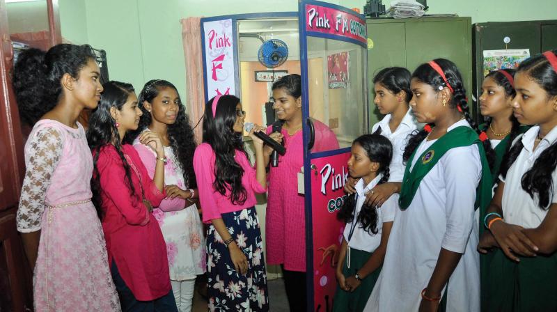 Experiments, projects, surveys and seminars were very much a part of the new school curriculum which was designed within the social constructivist theoretical framework. (In pic): Students at Cotton Hill Government Girls High School, Thiruvananthapuram, take part as Radio Jockeys during the inauguration of the Pink Radio at the school in Thiruvananthapuram.  	(File)