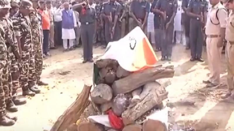 BSF jawan Jitendra Singhs body being cremated with full state honours. (Photo: Video grab)