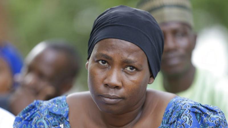 Esther Yakubu, mother of Maida Yakubu said she could not believe that her daughter could choose to stay with the miltants than come back home. (Photo: AP)