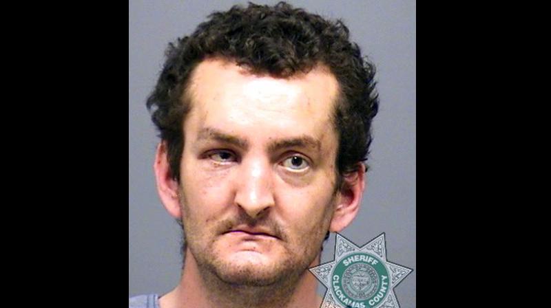 A man carrying what appeared to be a human head walked into a grocery store in Oregon and stabbed an employee. (Photo: AP)