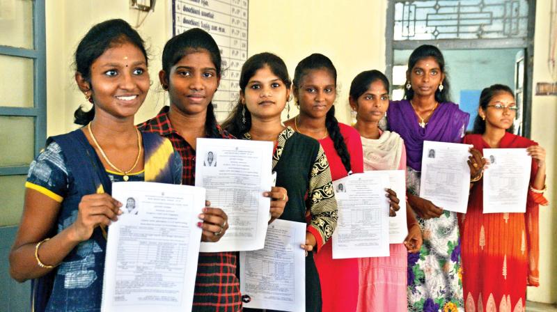 Students of Presidency higher secondary school for girls in Egmore receive their plus-2 mark sheets on Monday. (Photo: DC)
