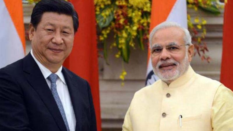 Prime Minister Narendra Modi (right) and Chinese President Xi Jinping	(Photo: AP)