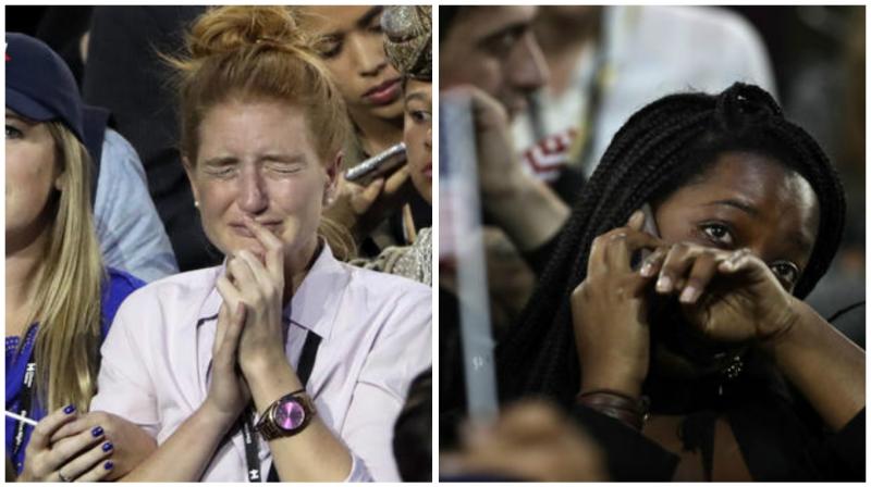 Supporters break into tears as they watch the election results during Democratic presidential nominee Hillary Clintons election night rally in the Jacob Javits Center glass enclosed lobby in New York.