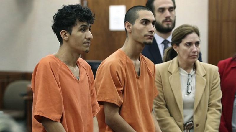 22-year-old Miguel Alvarez-Flores and 18-year-old Diego Hernandez-Rivera appeared in court Wednesday on charges of aggravated kidnapping and murder. (Photo: AP)