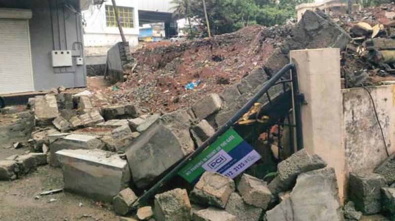 Remains of the collapsed boundary wall. (Photo:  DC)