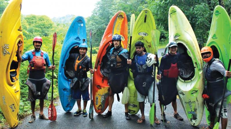 A Kayaking team pose with their gear at Thusharagiri.