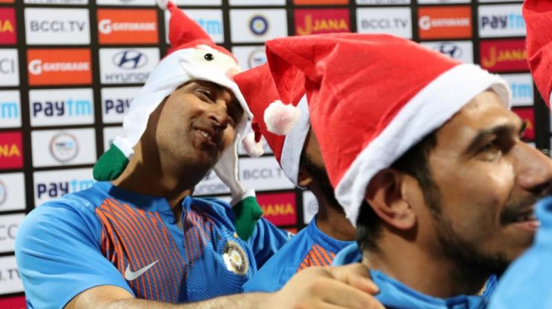 MS Dhoni and other Indian players brought Christmas cheer for their fans by donning Santa Claus caps. (Photo: BCCI)