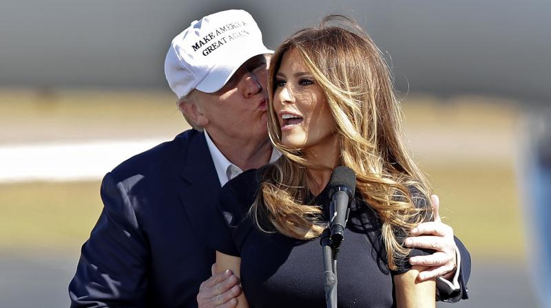 Presidential-elect candidate Donald Trump kisses his wife Melania Trump. (Photo: AP)