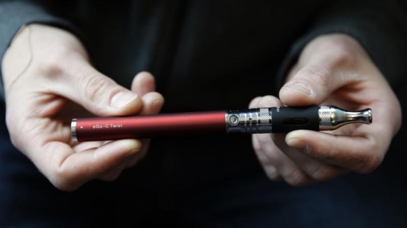 E-cigarettes are hand-held devices that vaporize liquid nicotine. (Photo: AP)
