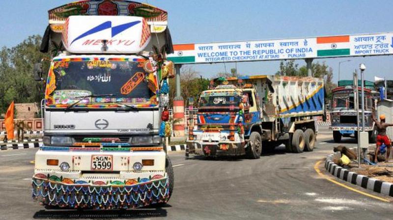 Pakistani trucks passing through the India-Pakistan Attari-Wagah joint check post. (Photo: PTI)