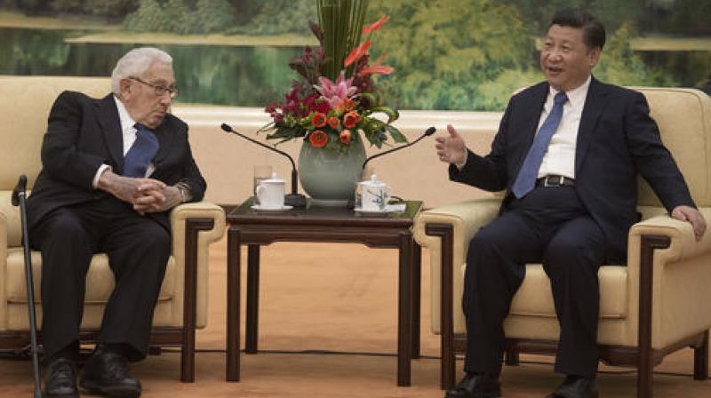 Former US Secretary of State Henry Kissinger, left, meets Chinas President Xi Jinping at the Great Halll of the People in Beijing . (Photo: AP)