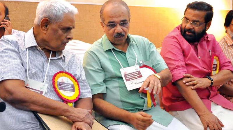 Dr M.G.S. Narayanan, A. Pradeep Kumar, MLA, and tourism minister Kadakampally Surendran share a point  during the one-day tourism conclave organised by the DTPC in Kozhikode on Sunday. (Photo: DC)