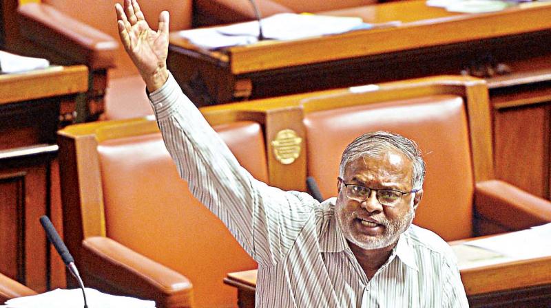 BJP leader Suresh Kumar makes a point in the Assembly on Wednesday.