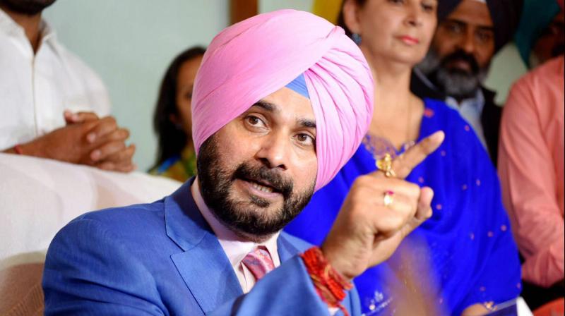 Navjot Singh Sidhu addresses media after taking charge as the Punjabs Local Bodies Minister in Chandigarh. (Photo: PTI)