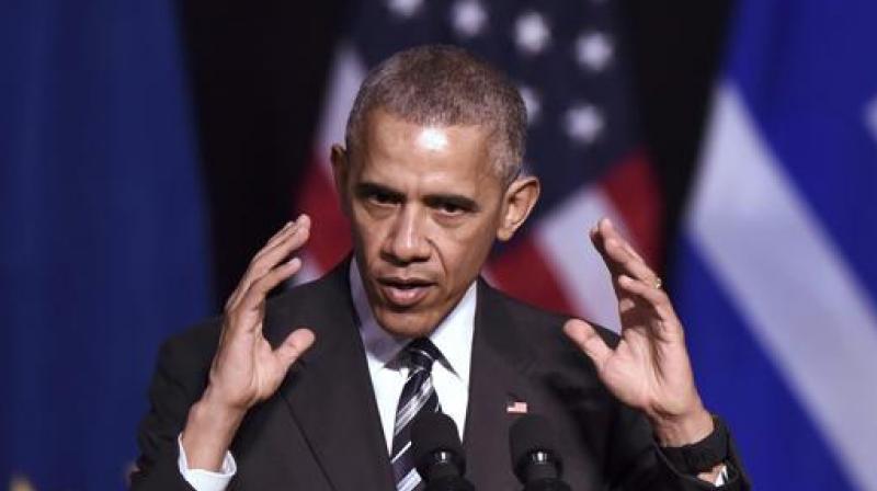 US President Barack Obama gestures as he speaks at the Niarchos foundation in Athens on Wednesday. (Photo: AFP)