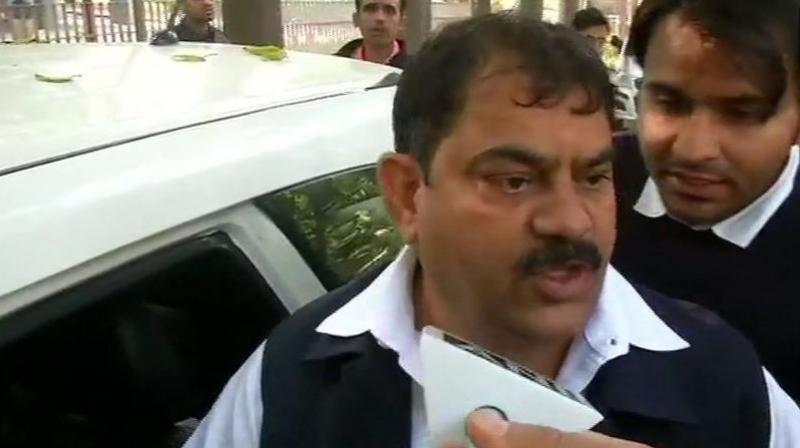 Searches are on at my residence. What will they get when there is nothing. They are taking me to ED office for questioning, Congress worker Jagdish Sharma told ANI. (Photo: ANI)