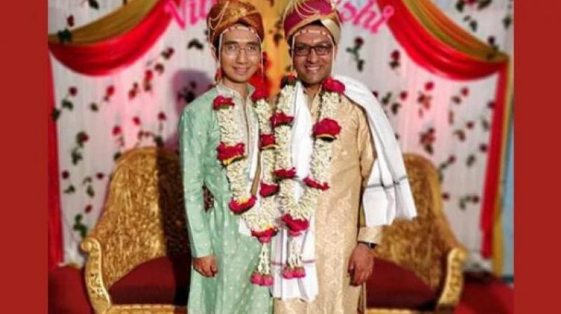 With the blessings of their families and friends, Yavatmal native Hrishi Mohankumar Sathawane (40) married Vinh, from Vietnam at a hotel a few distance away from the office of the Superintendent of Police. (Photo: ANI)