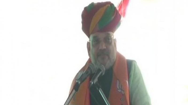 Shah said, Congress president Rahul Gandhis great grandfather Jawaharlal Nehru, grandmother Indira Gandhi, father Rajiv Gandhi and mother Sonia Gandhi ruled India for 70 years yet they did not give the poor and the backward people their due rights. (Photo: ANI | Twitter)