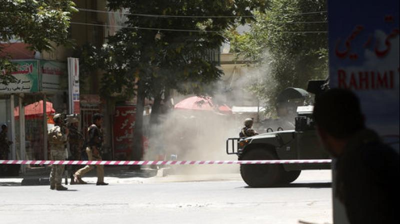 There were conflicting reports of casualties as the attack unfolded, with a witness at the scene saying he saw bodies of at least two policemen lying on the road outside the embassy soon after the attack began. (Photo: AP)