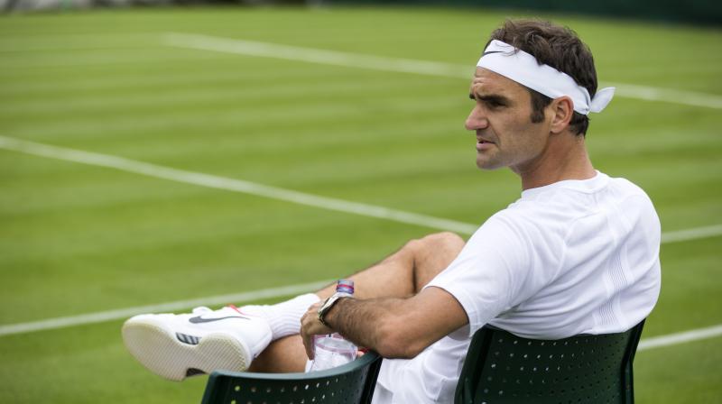 Here he is, Roger Federer, about to turn 36 next month, about to tie a record by playing in his 70th major tournament and, lo and behold, back to his old status as a popular pick to take home the title when Wimbledon begins on Monday. (Photo: AP)