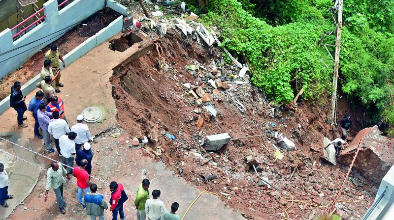 A wall collapsed due to the rain at Naidunagar in Banjara Hills. (Photo: DC)