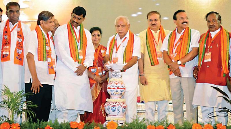 BJP leaders V. Srinivas Prasad, Jagadish Shettar, Muralidhar Rao, B.S. Yeddyurappa, H.N. Ananth Kumar, D.V.Sadananda Gowda and K.S. Eshwarappa at the state units executive committee meeting in Mysuru on Saturday. (Photo: KPN)