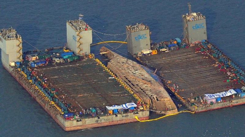 In pics: 6,800-ton South Korean ferry that sank 3 years ago lifted from sea