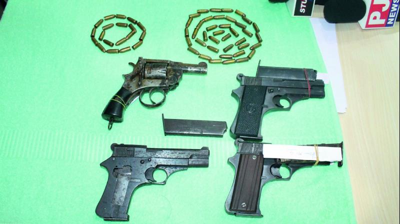 The weapons that were seized from the arrested individuals. 	(Photo: DC)