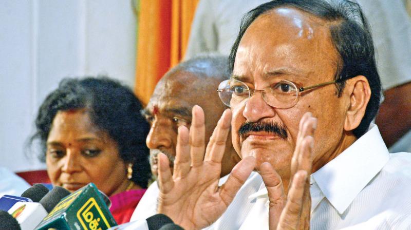 Union information and broadcasting minister M. Venkaiah Naidu addresses media at city party office on Monday.  Union Minister Pon Radhakrishnan and state BJP President Tamilisai Sounderarajan are also seen. (Photo: DC)