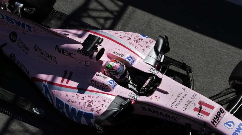 Race stewards said Force India, whose cars have a striking pink livery but no prominent numbers, had failed to comply. (Photo: AP)