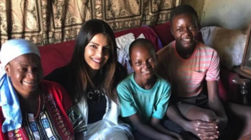 Priyanka with one of the families she met during her trip to Zimbabwe for UNICEF (Pic courtesy: Instagram/ priyankachopra).