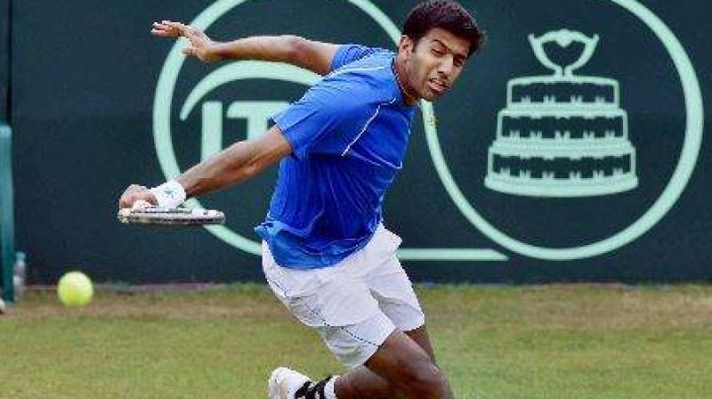 Rohan Bopanna, Marcin Matkowski pair knocked out Romanias Florin Mergea and Serbias Viktor Troicki 6-3 6-4 in the quarter-finals. (Photo: PTI)