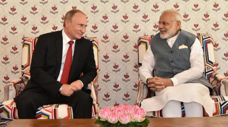 Prime Minister Narendra Modi meets Russian President Vladimir Putin in Goa. (Photo: ANI Twitter)