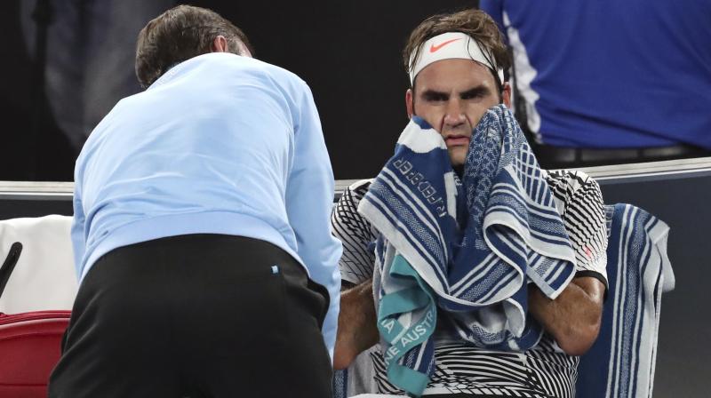 Roger Federer defended his right to receive treatment, saying he had been feeling pain in his upper right thigh for much of the tournament. (Photo: AP)