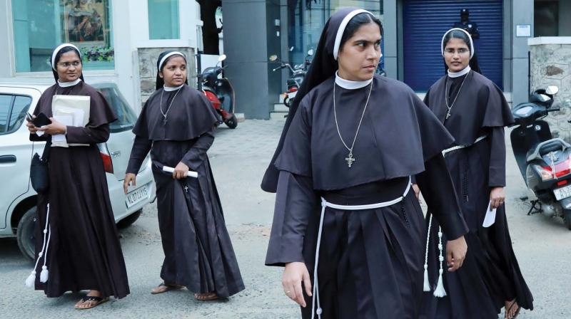 Nuns leave for their convent after the seventh day of the sit-in strike demanding the arrest of Bishop Franco Mulakkal, who is accused of raping a nun, in Kochi on Friday. 	 (Photo:ARUN CHANDRABOSE)
