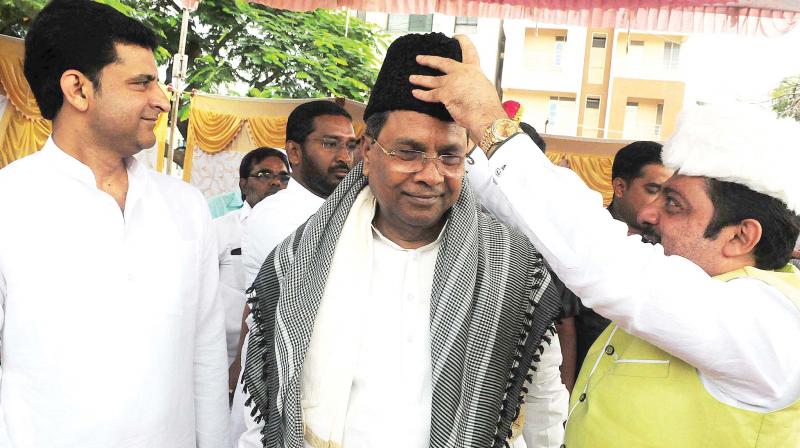 Former Chief Minister Siddaramaiah and minister Zameer Ahmed Khan at a Bakrid programme in Bengaluru on Wednesday  (Image: DC)