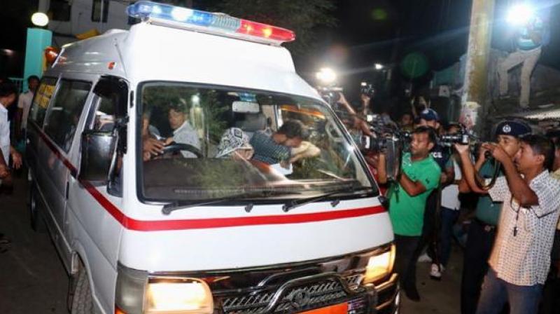 An ambulance leaves Khulna Jail carrying body of Asadul Islam after he was executed in Khulna. (Photo: AFP)